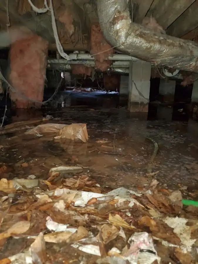 Crawl space flood assessment for Commercial Water Damage Restoration in Iola